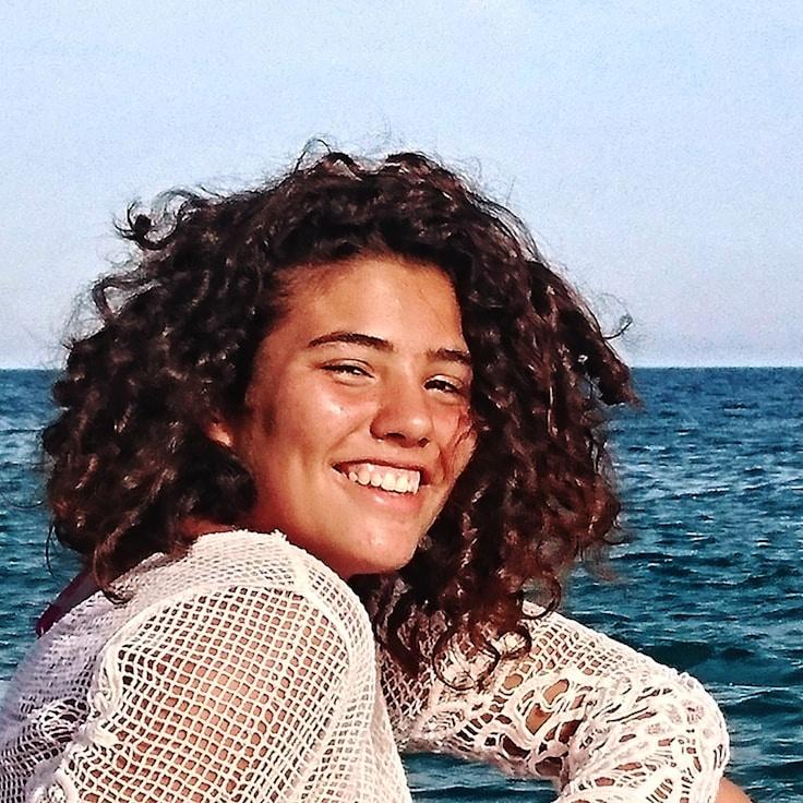 Portrait of Maya Chen, group coordinator and fusion cooking expert